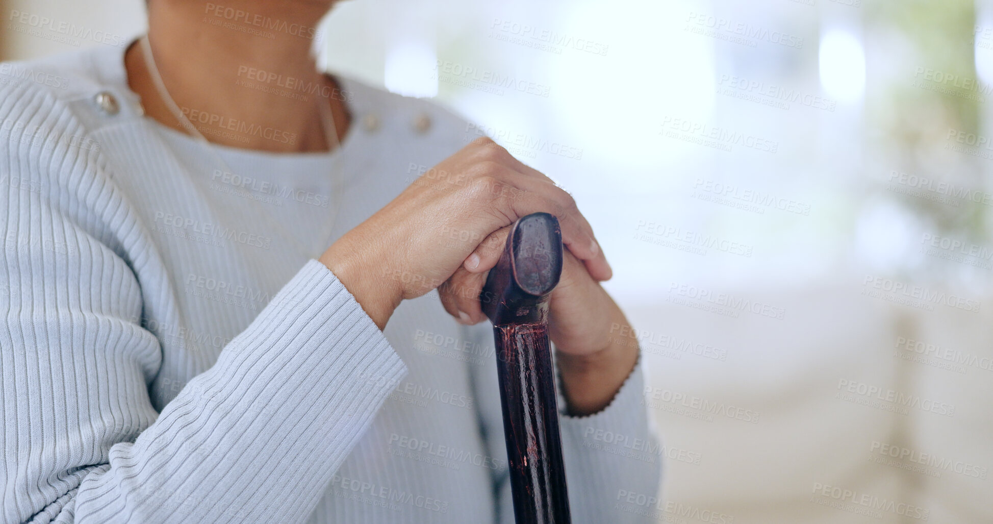 Buy stock photo Hands, walking stick and closeup for woman in home with injury, recovery and wellness for mobility. Person with disability, cane and rehabilitation from accident for healthcare, progress and steps