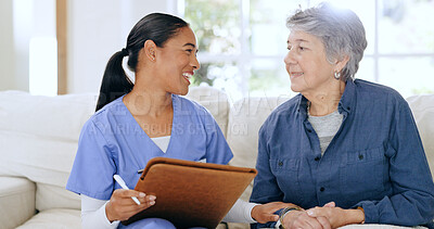 Buy stock photo Writing, home and nurse with senior woman on sofa for medical care, support and service. Healthcare, retirement and caregiver with elderly patient documents for insurance, consultation and report