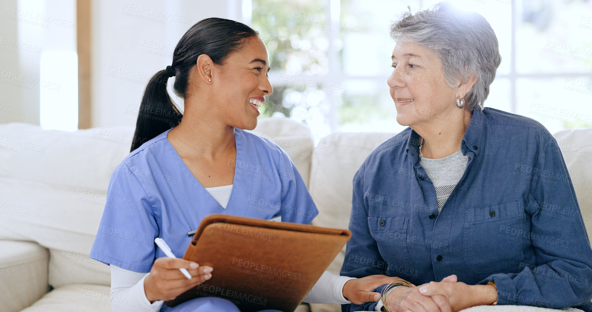 Buy stock photo Writing, home and nurse with senior woman on sofa for medical care, support and service. Healthcare, retirement and caregiver with elderly patient documents for insurance, consultation and report