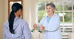 Dumbbell weights, physiotherapy and an old woman with a volunteer in a nursing home for training. Health, fitness or exercise with a senior patient and caregiver in a living room for physical therapy