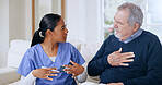 Nurse, communication and elderly man with chest pain, lunge cancer or sick from heart infection, virus or tuberculosis. Caregiver consultation, healthcare support and client explain breathing problem