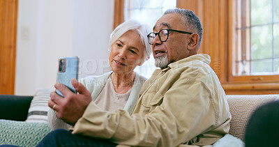 Buy stock photo Senior couple, cellphone and communication in home for call connection, online chat or social media. Man, woman and happy partnership on mobile for internet network or speaking web, talking on couch