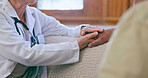 Support, care and doctor holding hands with patient for medical diagnosis or treatment planning. Consulting, affection and closeup of healthcare worker comforting a man in living room of nursing home
