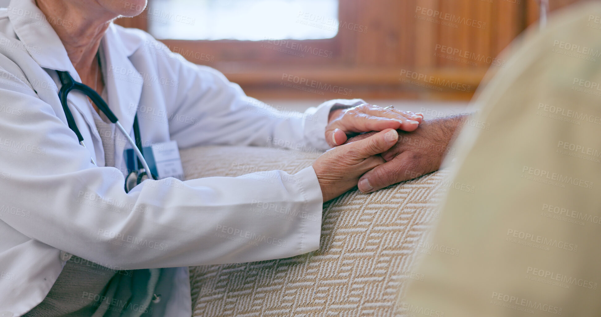 Buy stock photo Support, care and doctor holding hands with patient for medical diagnosis or treatment planning. Consulting, career and closeup of healthcare worker comforting a man in living room of nursing home.