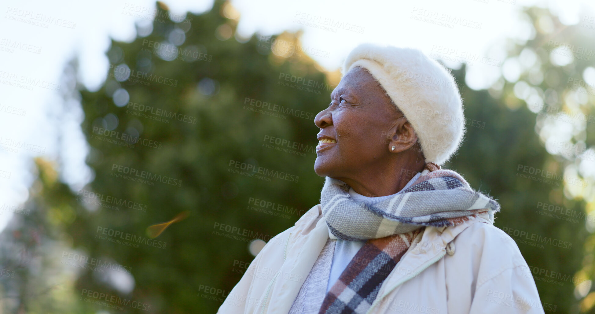 Buy stock photo Happy, thinking and senior woman in a park with a smile for freedom, good mood or positive mindset. Nature, calm and African female person in a forest for travel, adventure or journey in retirement