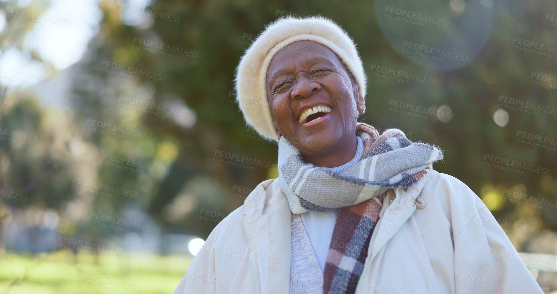 Buy stock photo Face, smile and a senior black woman laughing outdoor in a garden during summer for freedom or energy. Nature, environment and happy with a funny elderly person in a park for retirement wellness