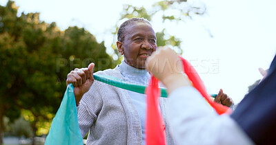 Buy stock photo Senior woman, stretching band or nurse outdoor for exercise, workout or fitness in a park and happiness. People, professional or caregiver with physical activity for physiotherapy, wellness or health