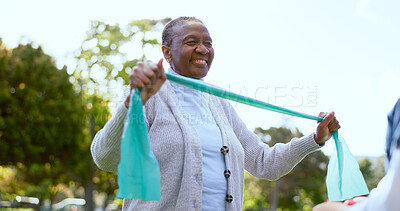 Buy stock photo Elderly, woman and physiotherapy for fitness with resistance band in park, outside or garden for wellness. Black person, smile and happy with results in mobility, recovery or rehabilitation of injury