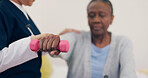 Caregiver, elderly woman or dumbbell on bed to help, exercise or wellness in physiotherapy. Nurse, black person or fitness in bedroom in physical therapy, senior patient or healthcare in retirement 