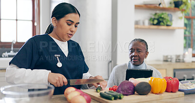 Buy stock photo Nurse, cooking and senior woman in home with healthy food, vegetables and nutrition in healthcare. Retirement, caregiver and helping elderly person in kitchen with diet and online recipe on tablet