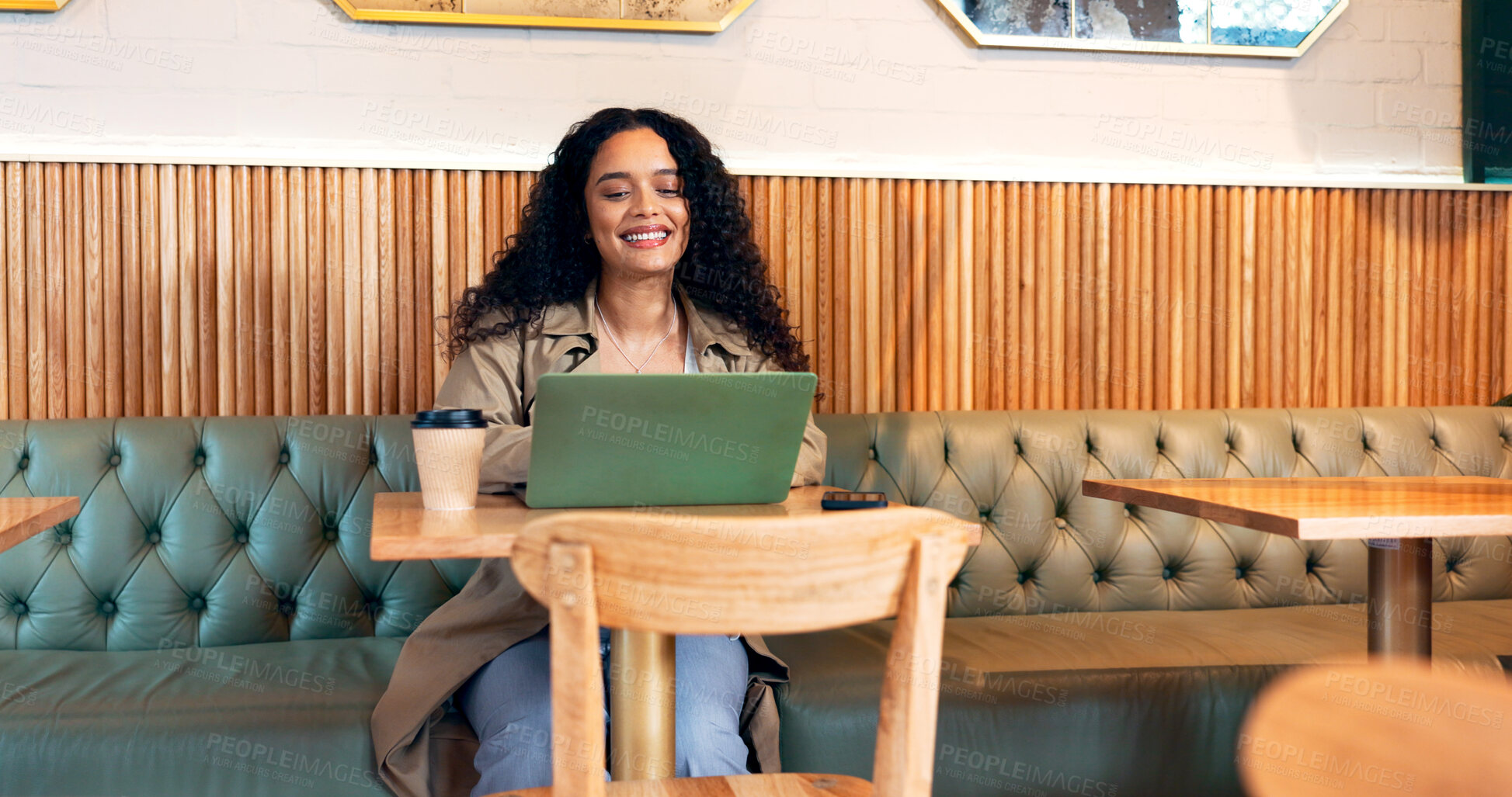 Buy stock photo Happy woman in cafe, typing on laptop and remote work, reading email or writing blog, article or search on technology. Computer, freelancer or copywriting in coffee shop, store or restaurant at table