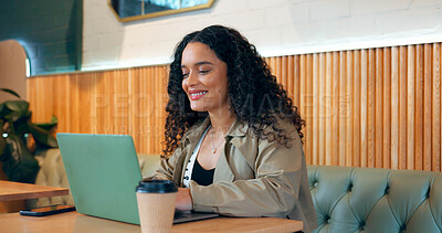 Smile of woman in cafe, typing on laptop and remote work, reading email or writing blog, article or research on internet. Computer, happy freelancer and copywriting in coffee shop at restaurant table