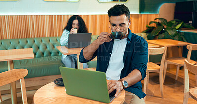 Man, coffee shop drink and laptop for online research, remote work and typing on website, blog or social media. Freelancer, writer or customer listening to music on computer in cafe or restaurant