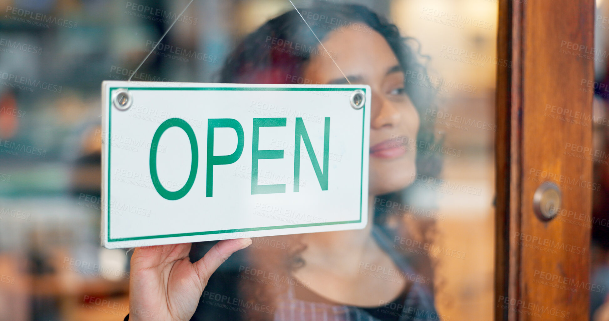Buy stock photo Woman, small business or open sign on window in coffee shop or restaurant for service or advertising. Ready, start or entrepreneur holding board, poster or welcome for message in retail store or cafe
