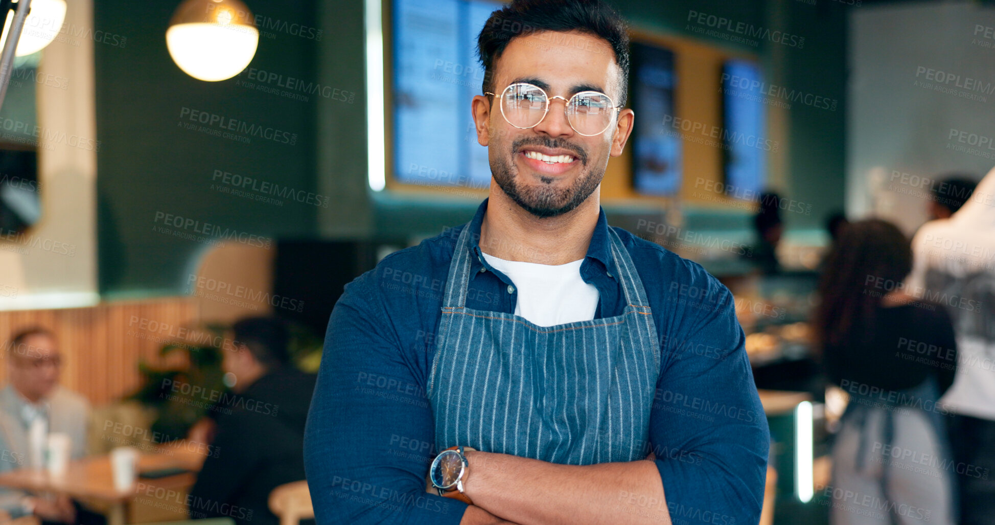 Buy stock photo Waiter, man and portrait with arms crossed or smile for service, welcome or server in coffee shop. Barista, person and face with happiness for hospitality, career or confidence in restaurant or cafe