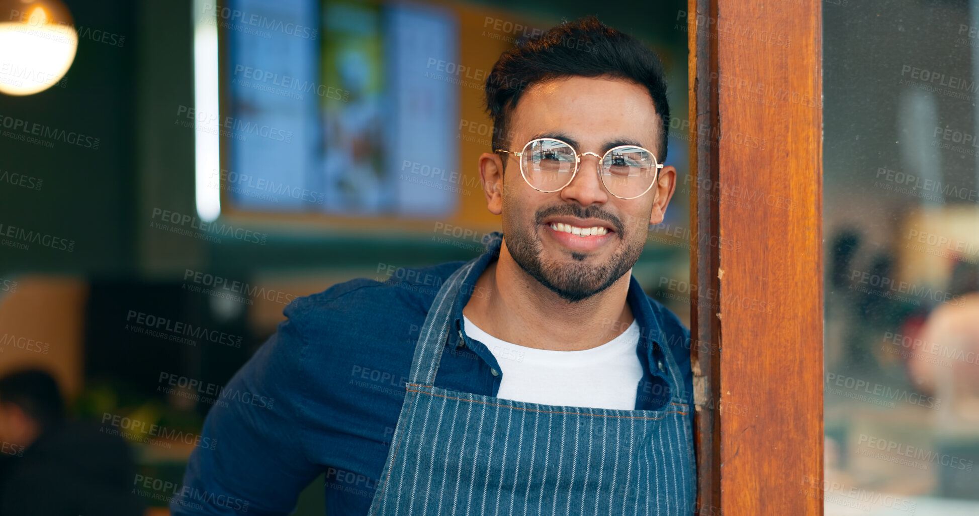 Buy stock photo Portrait, entrance and happy man, restaurant business owner or coffee shop manager smile for cafeteria service. Hospitality, management and confident barista, waiter or server leaning on cafe door