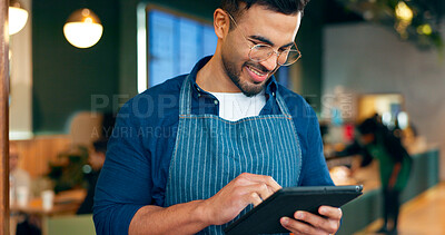 Cafe, man and business owner on tablet for restaurant sales, online management or customer service reviews. Happy entrepreneur, waiter or barista typing on digital technology for coffee shop startup