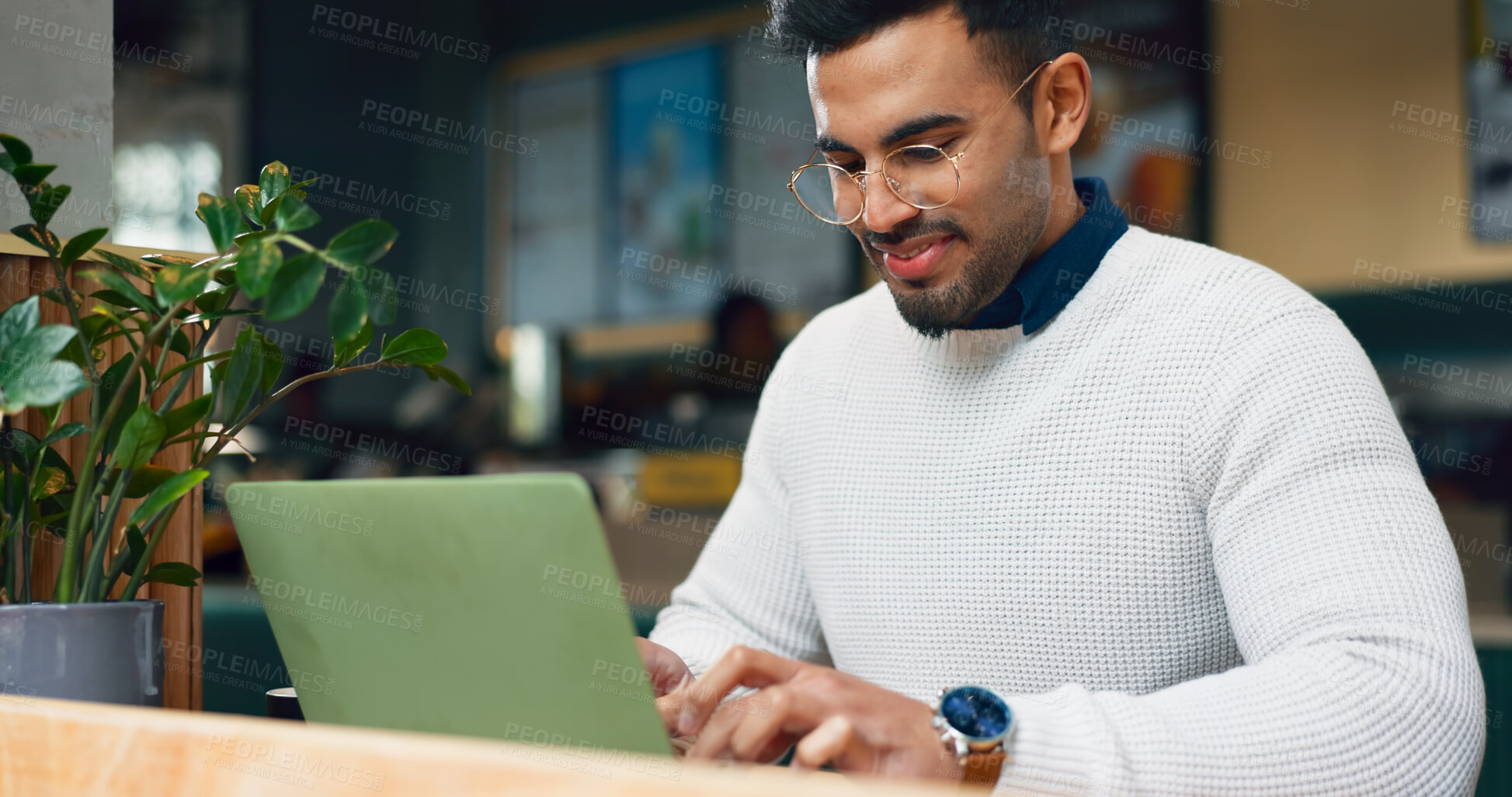 Buy stock photo Man, typing and laptop in cafe for remote work, research or networking for business with smile. Face, person and happiness with technology in coffee shop for copywriting, internet and freelancer