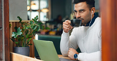 Buy stock photo Man, remote work and cafe with laptop, earphones and drink with reading, data analysis or thinking. Journalist, freelancer and ideas with computer, coffee shop and process for story, news or research
