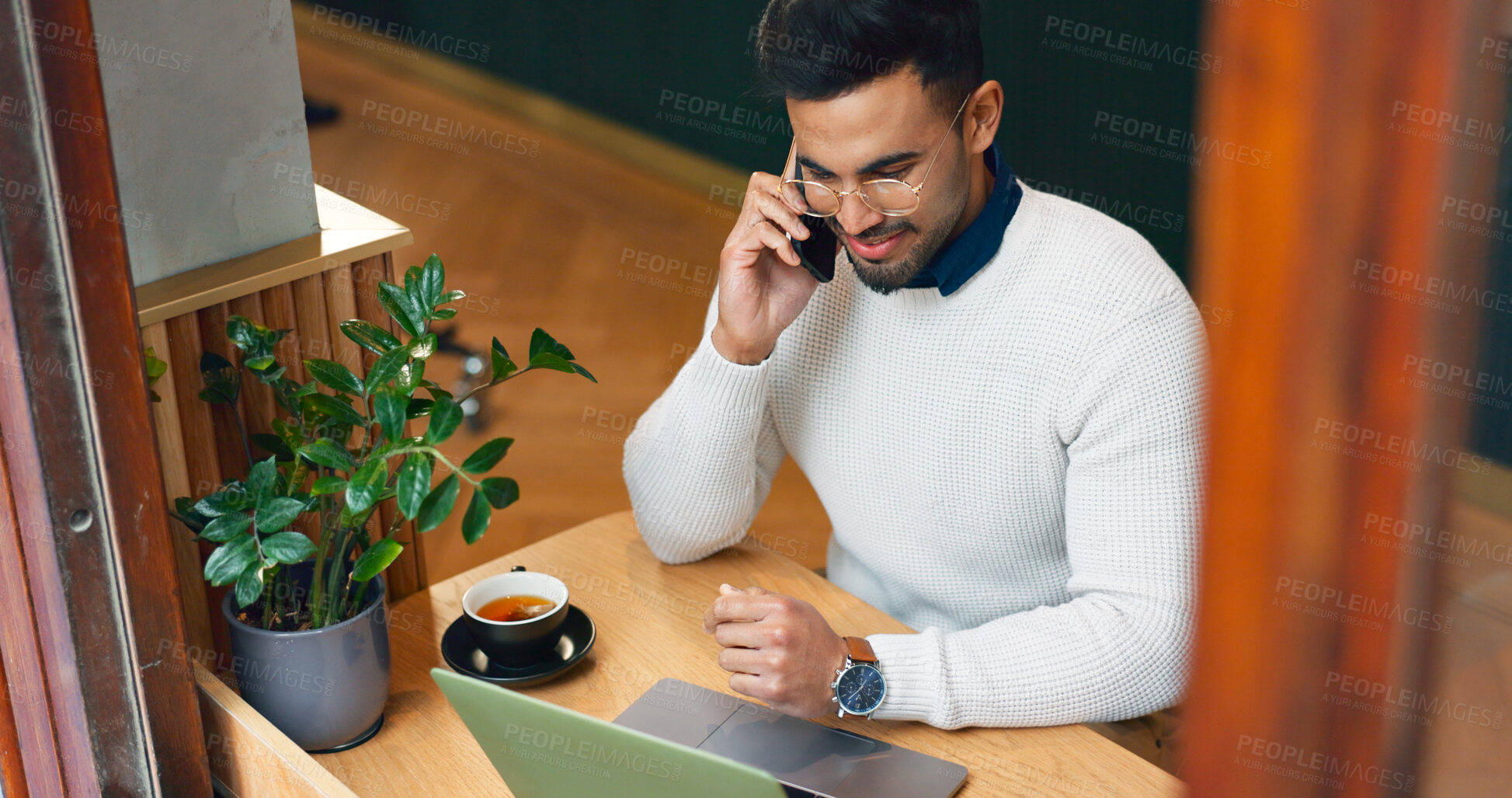 Buy stock photo Man, phone call and computer at cafe for remote work, communication and planning or talking of website design. Freelancer on mobile, chat and laptop for internet at coffee shop or restaurant above