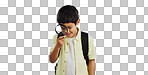 Search, looking and a child with a magnifying glass on a blue background for inspection or education. Studying, learning and a boy kid with tools for research, detective work or curious with a lens