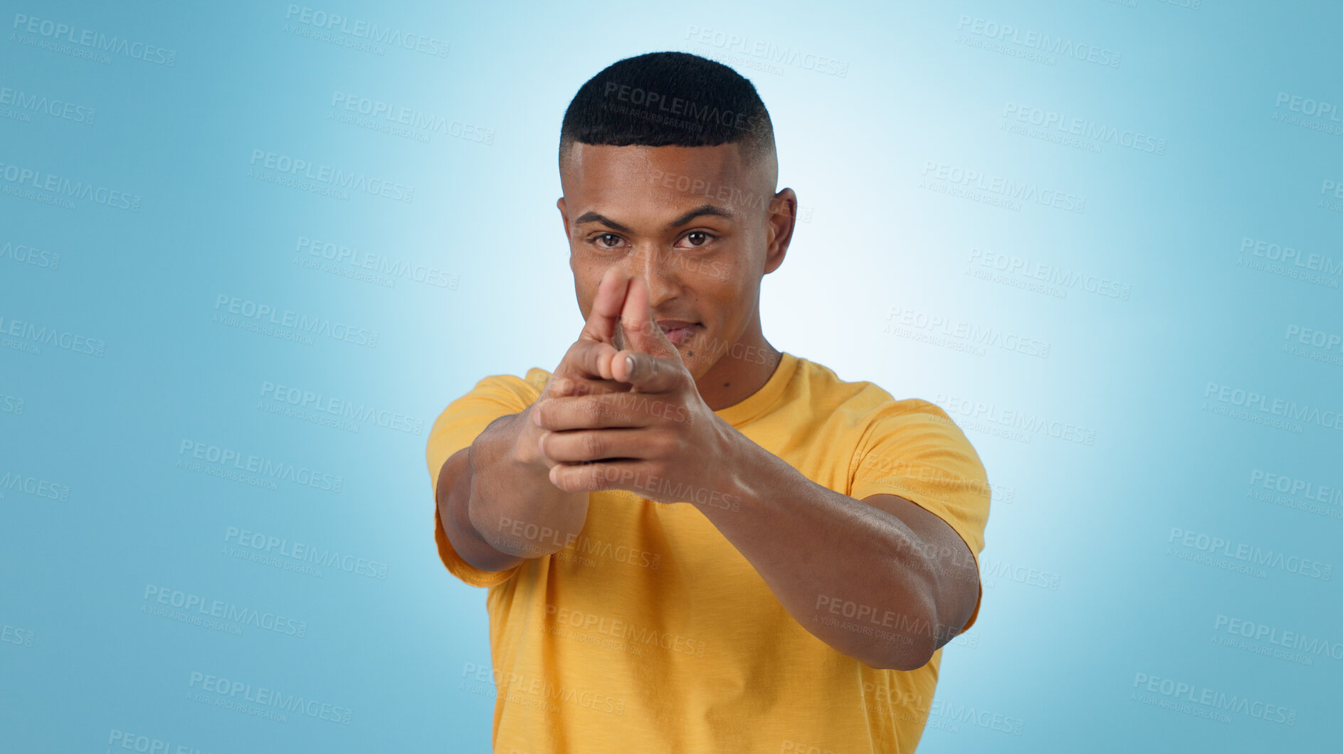 Buy stock photo Portrait, finger gun and man aim at target in studio isolated on a blue background mockup space. Face, shooting hand gesture or African person pointing pistol weapon for self defence to kill criminal