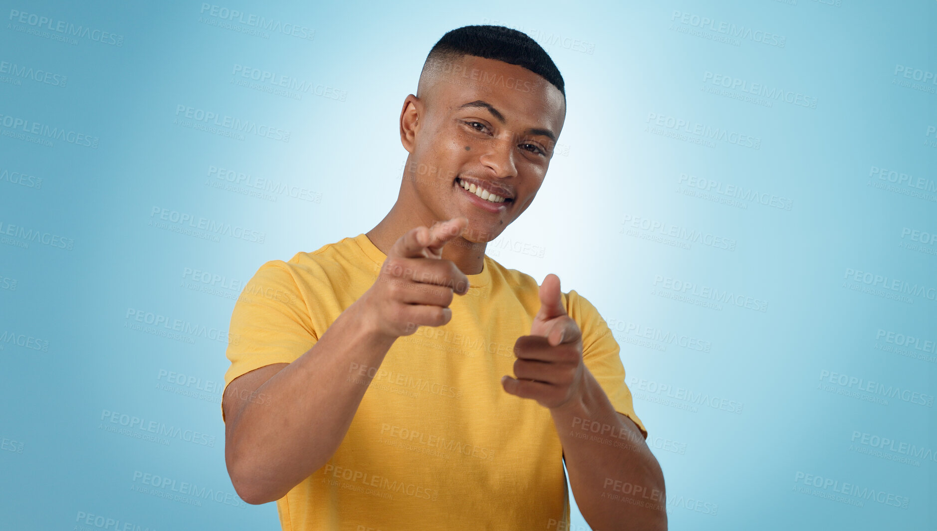 Buy stock photo Happy man, portrait and pointing to you for choice, selection or hiring against a blue studio background. Male person or model and finger for decision, choose or opportunity in recruiting on mockup