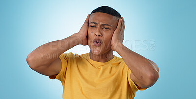 Buy stock photo Fail, mistake and hands on face of man in studio with disaster, news or oops gesture on blue background. Crisis, emoji and male model with regret, fear or trauma, body language or conflict anxiety