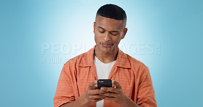 Buy stock photo Doubt, confused and man with a smartphone, typing and connection on a blue background. Person, guy and model with a cellphone, mobile user and reaction with error 404, phishing and contact with app