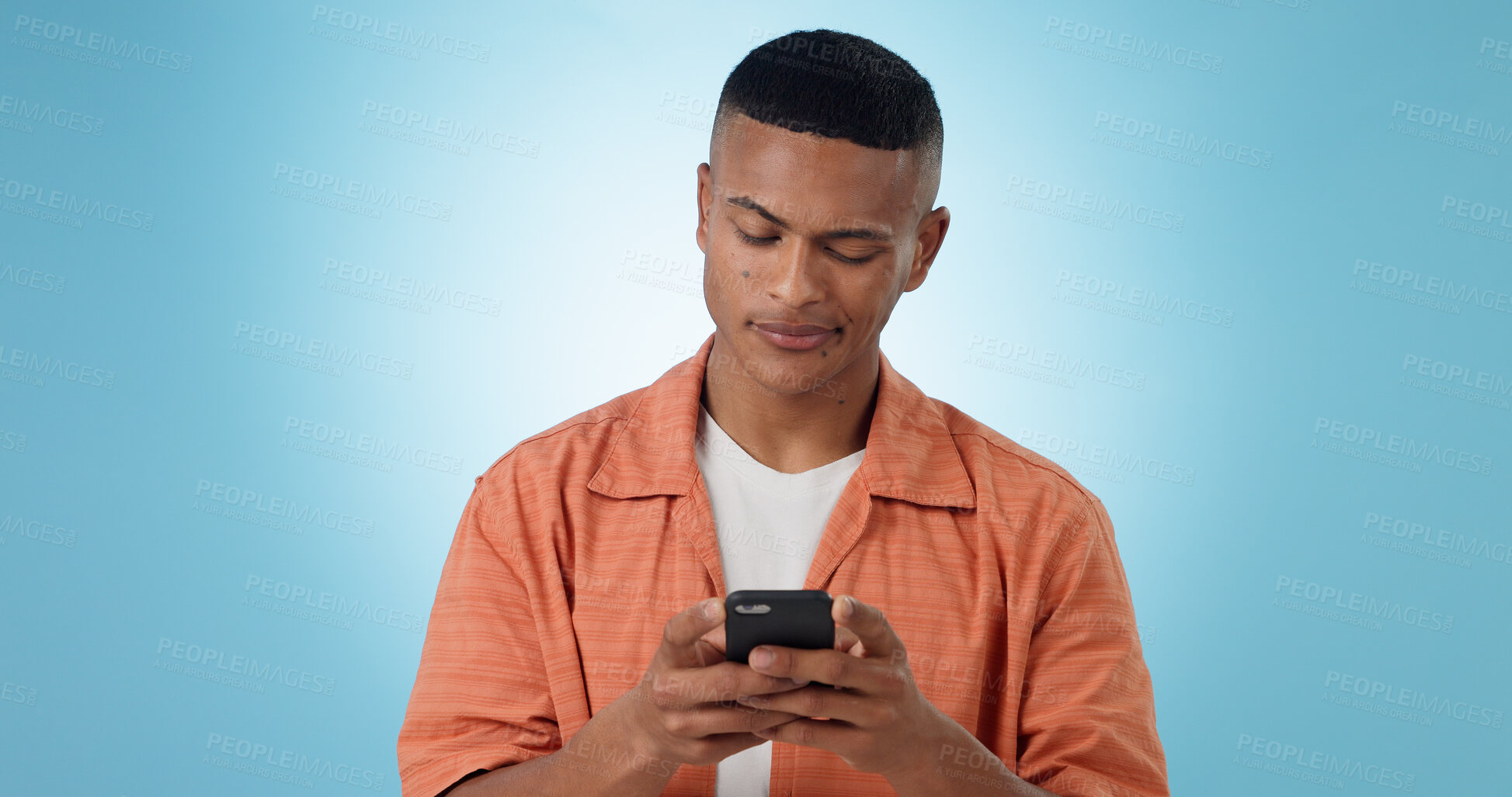 Buy stock photo Doubt, confused and man with a smartphone, typing and connection on a blue background. Person, guy and model with a cellphone, mobile user and reaction with error 404, phishing and contact with app