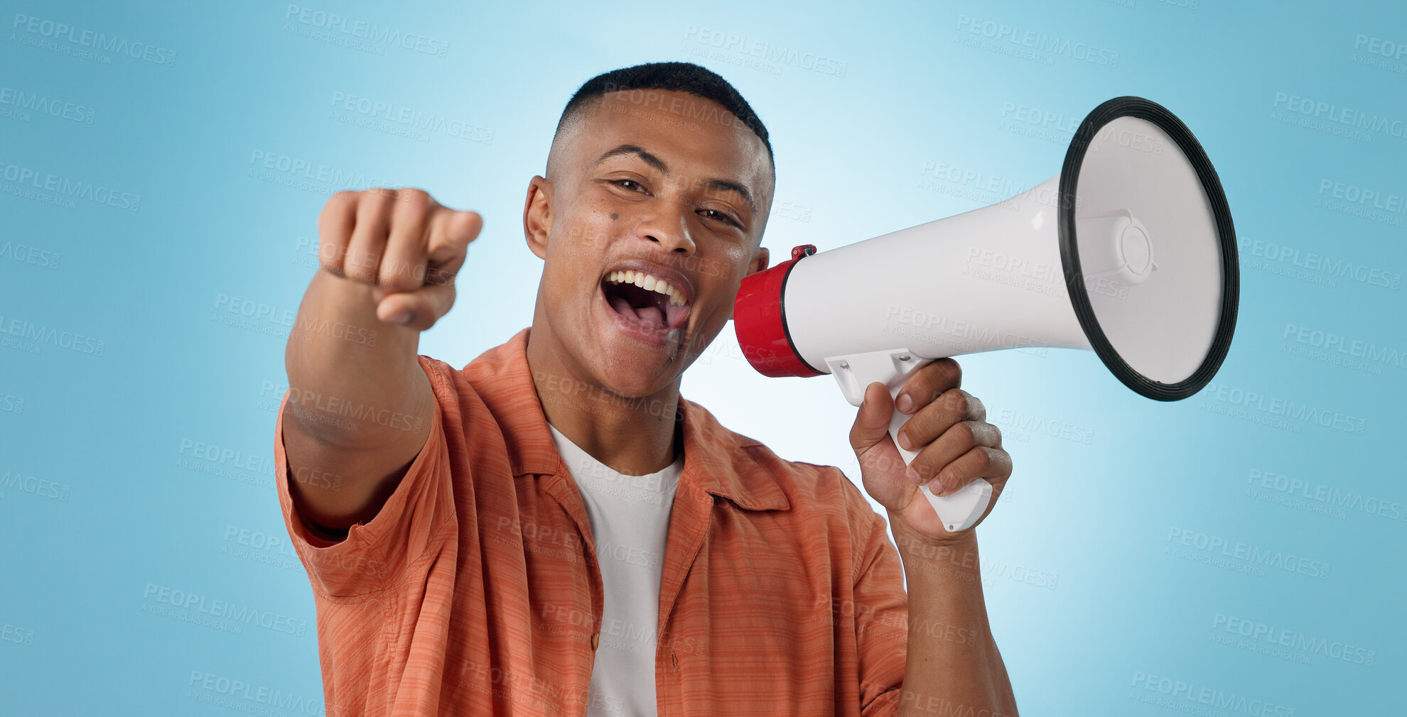 Buy stock photo Man, megaphone and winner or pointing you for announcement, broadcast and choice or news on blue background. Portrait of person for join us, attention and voice with sale, bonus or winning in studio