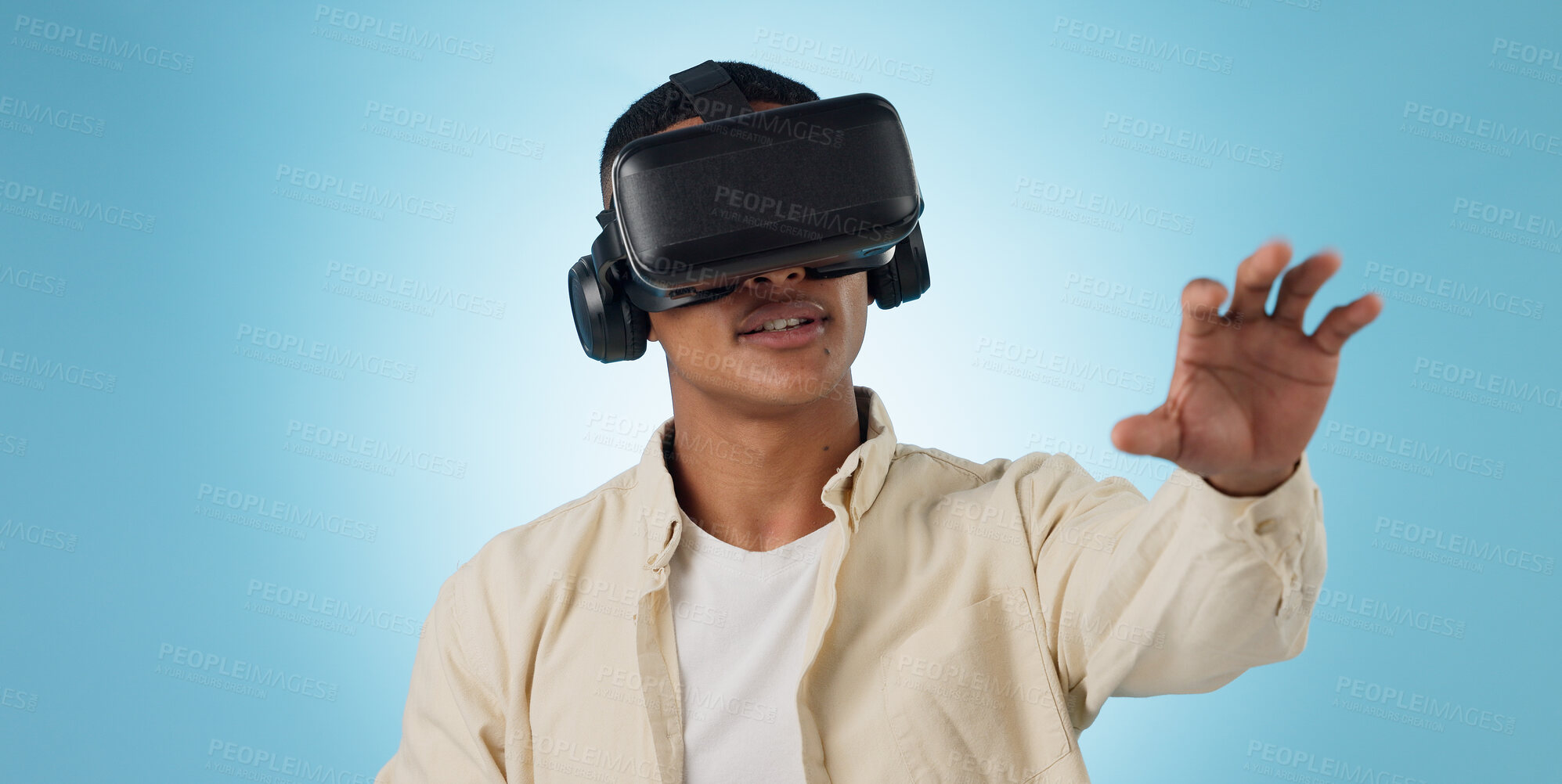 Buy stock photo Man, student and VR or futuristic glasses for e learning, 3d software and user experience on blue background. Person with virtual reality vision, education and metaverse technology or games in studio