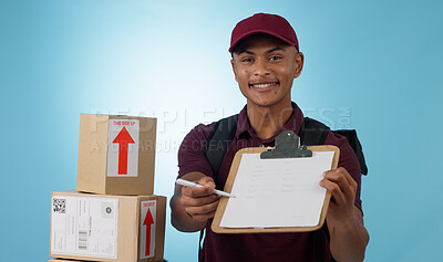 Buy stock photo Delivery man, boxes and document for signature, distribution or courier service checklist on a blue background. Portrait of logistics worker with package and receipt or clipboard paperwork in studio