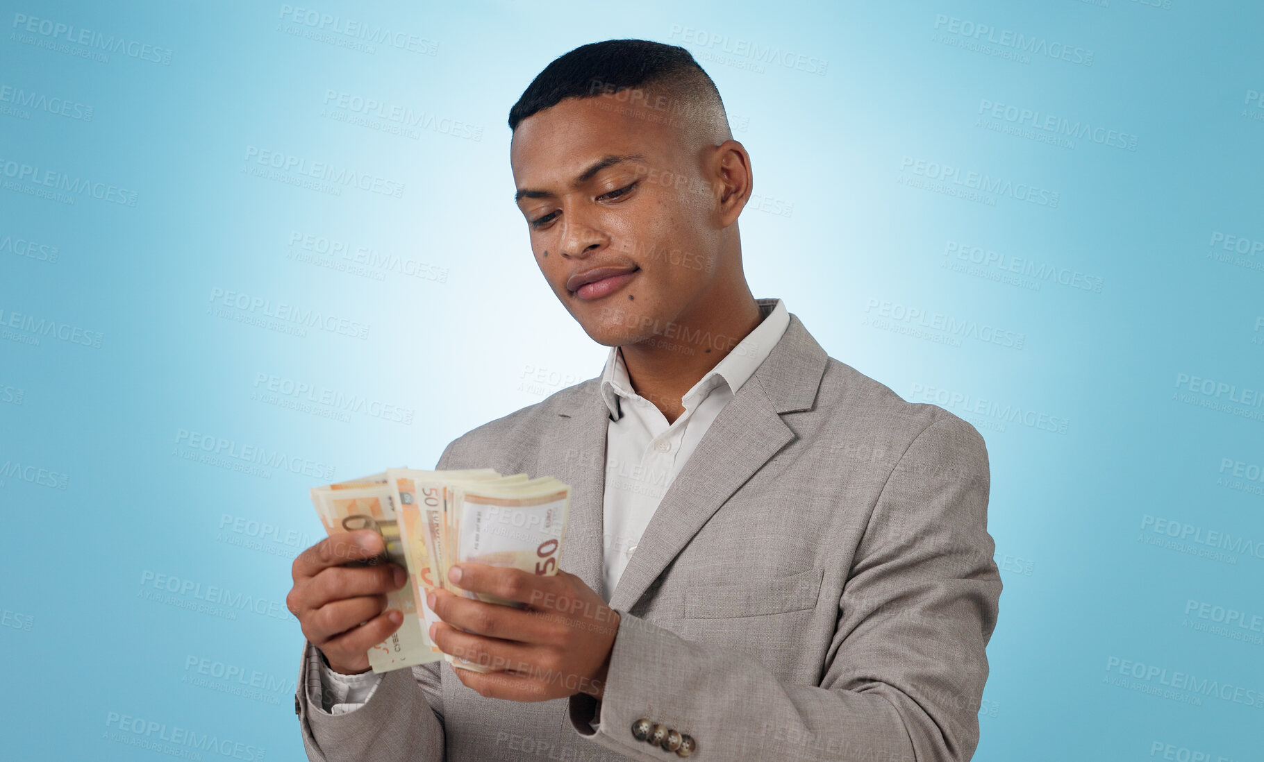Buy stock photo Business man, cash and money for financial investment, budget and trading, profit or counting his savings in studio. Young trader with decision or doubt for income, loan or salary on blue background