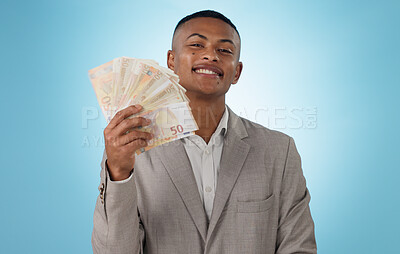Buy stock photo Business man, winner and money fan for success, bonus and winning in a competition, loan or cashback in studio. Portrait of young worker with cash, reward or financial savings on a blue background
