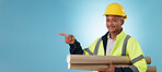 Man, construction worker and pointing with building plans, safety wear and architect on studio background. Professional, mockup space and industrial blueprint for engineering project, builder and job