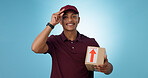 Happy man, shipping box or portrait of delivery guy in studio with courier service or supply chain package. Smile, blue background or worker greeting distribution, online shopping or post services 
