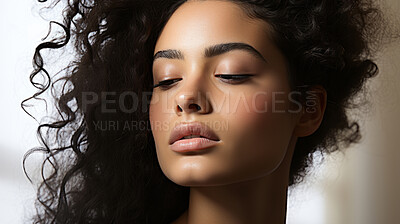 Close-up of model. Make-up, smooth skin, curly hair. Fashion, editorial concept.
