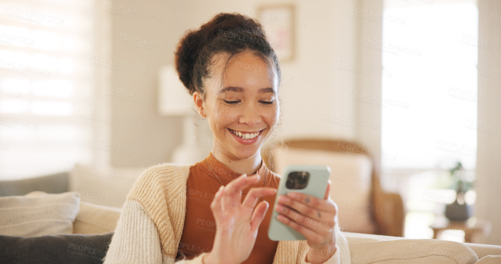 Buy stock photo Young woman, phone and laugh on sofa, thinking and relax in home living room for texting, web chat or blog. Girl, excited smile and smartphone with click, meme or social network app on lounge couch