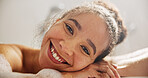 Health, smile and face of a woman in the bath at her home for zen, calm or self care routine. Happy, peace and headshot portrait of young female person relaxing in a tub in the bathroom in apartment.
