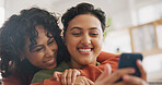 Phone, hug and a gay couple laughing together in their home while browsing a social media app. LGBT, love and comedy with happy lesbian women looking at a meme on a mobile for fun, romance or bonding