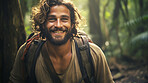 Portrait of a man or male hiking in a forest. Happy, smiling and looking. Cheerful forest hiker