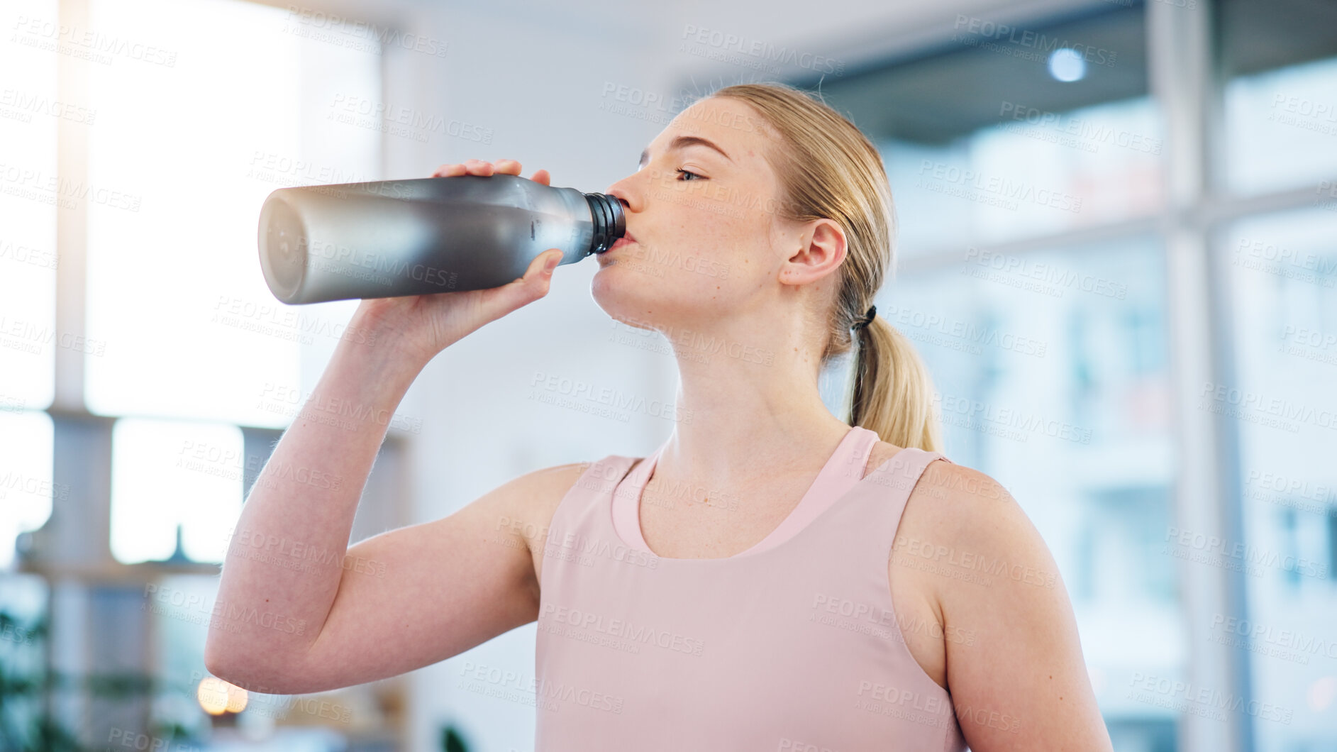 Buy stock photo Woman, home and drink of water for sports break, energy and workout performance. Thirsty athlete, bottle and nutrition of hydration, diet or healthy liquid for training, exercise or fitness in lounge