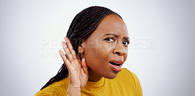 Buy stock photo Portrait of black woman, hand and ear in studio for gossip, story or frustrated face by grey background. African girl, hearing or confused by secret information, news and communication with questions