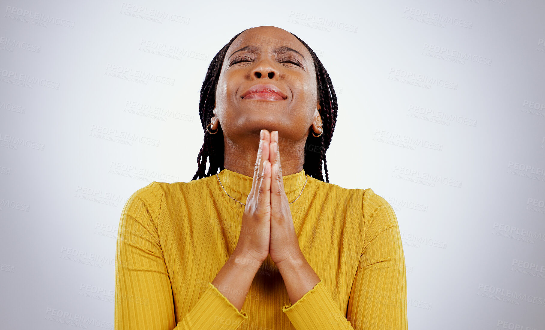 Buy stock photo Praying, hands and black woman with stress, hope and religion with faith on white studio background. African person, girl or model with anxiety, spiritual or Christian with emoji, worship or feedback