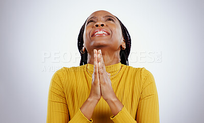 Buy stock photo Hands, praying and nervous black woman with wish in studio with sign of anxiety, faith or good luck in white background. Please, emoji and person with prayer, blessing or anxiety waiting for results