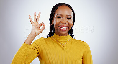 Buy stock photo Portrait, smile and black woman with perfect hand in studio for feedback, support or motivation on grey background. Ok, emoji and face of lady model with vote success, thank you or review excellence
