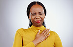 Heart pain, black woman and ache with stress, anxiety and problem from cardiology crisis in studio. White background, African female person and mental health with cardiac arrest and sick from grief