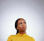 Woman, thinking and doubt with confused, decision and problem solving with idea by grey background. Businesswoman, african and gen z for brainstorming or entrepreneur choice, plan and studio mockup