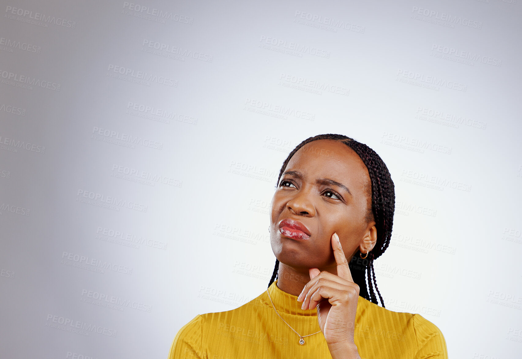 Buy stock photo Thinking, idea and black woman in a studio with memory, brainstorming and planning facial expression. Guess, question and young African female model with a confused face isolated by gray background.